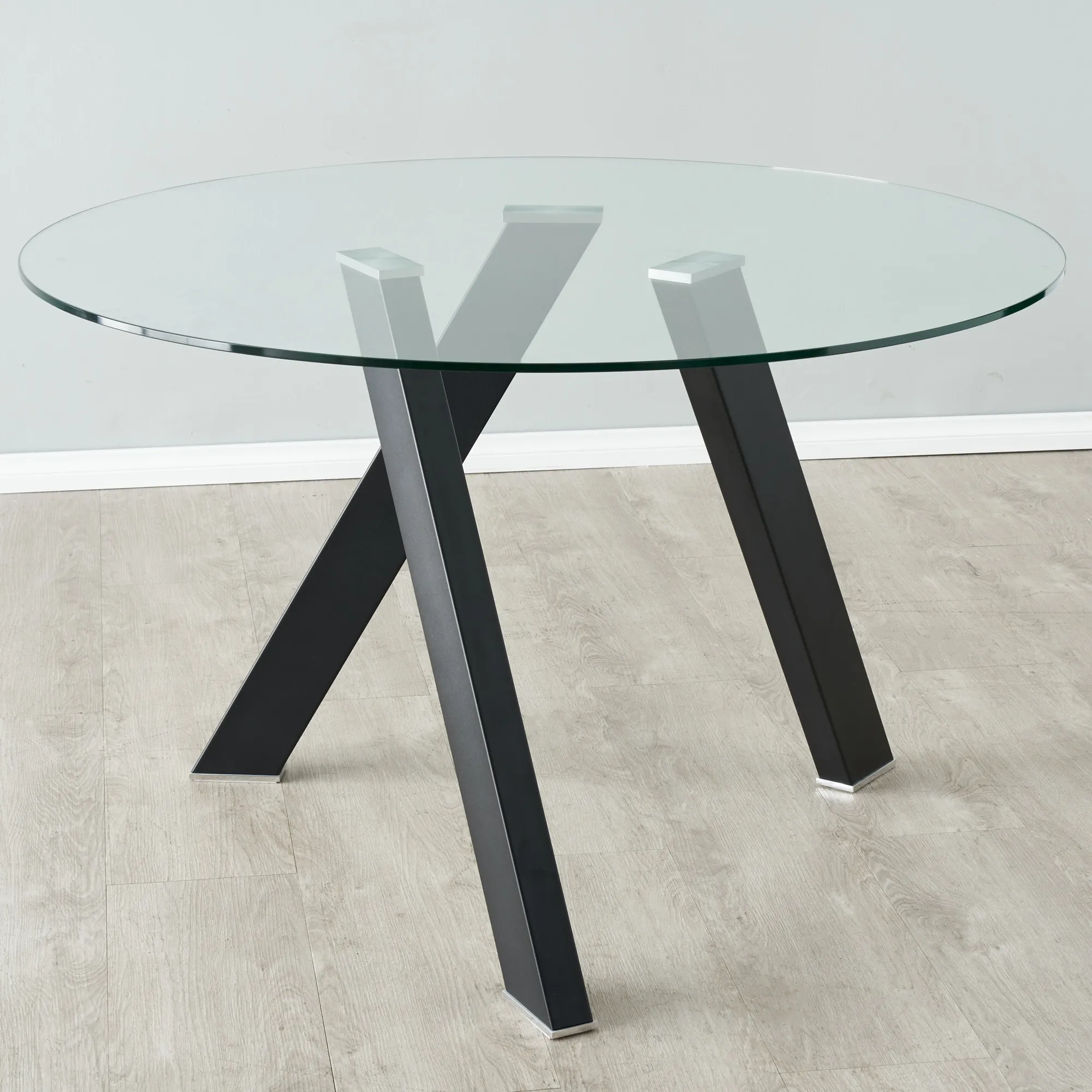 Jutta Glass 120cm Dining Table - Black Legs
