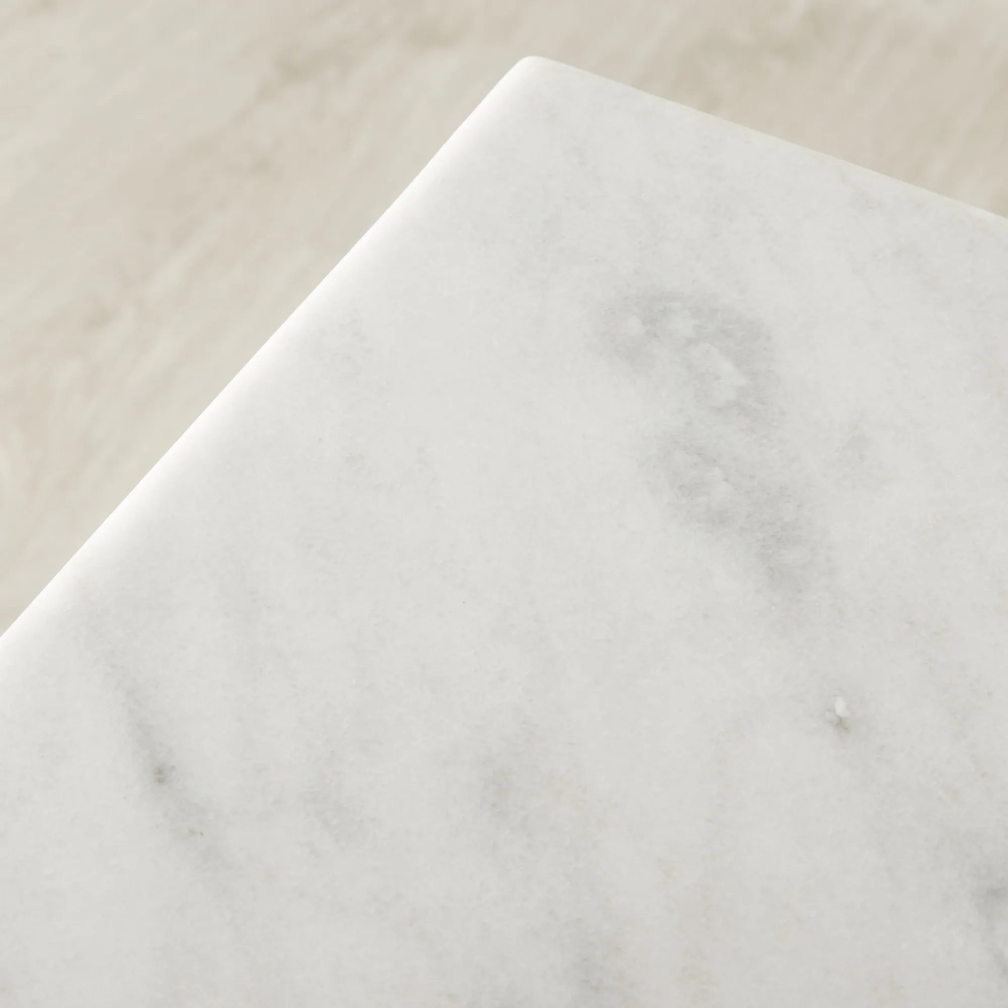 Isla Natural White Marble Dining Table - Black Metal Legs