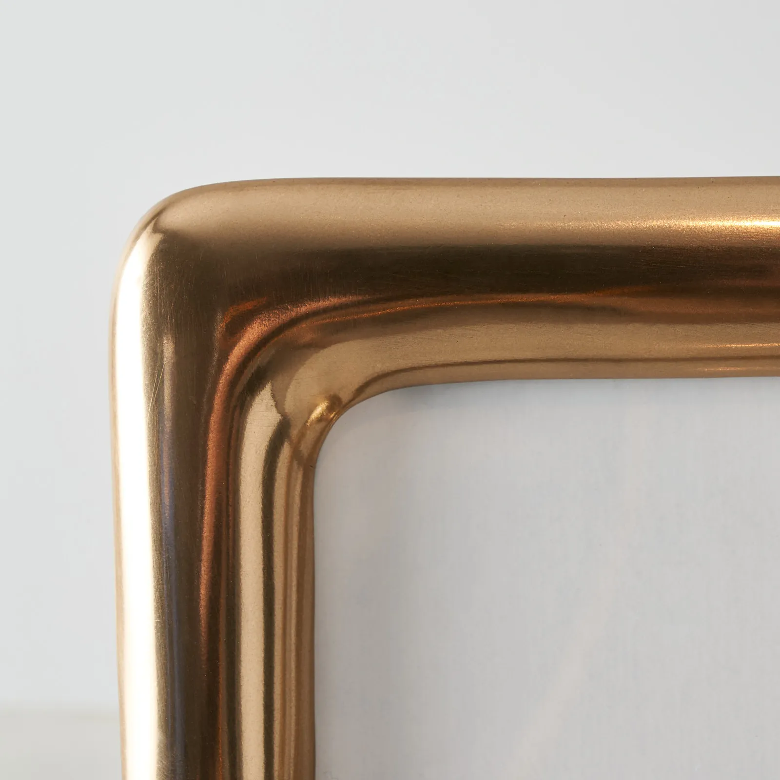 Desiree Polished Gold Metal Frame