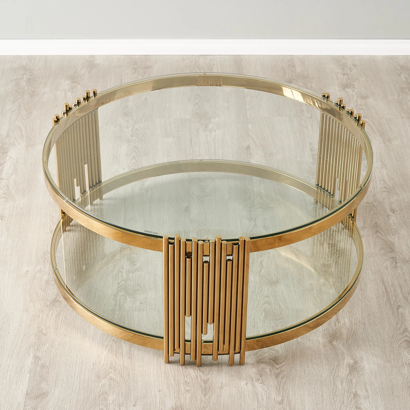 Lindsay Polished Gold Stainless Steel Round Coffee Table - Clear Glass Top