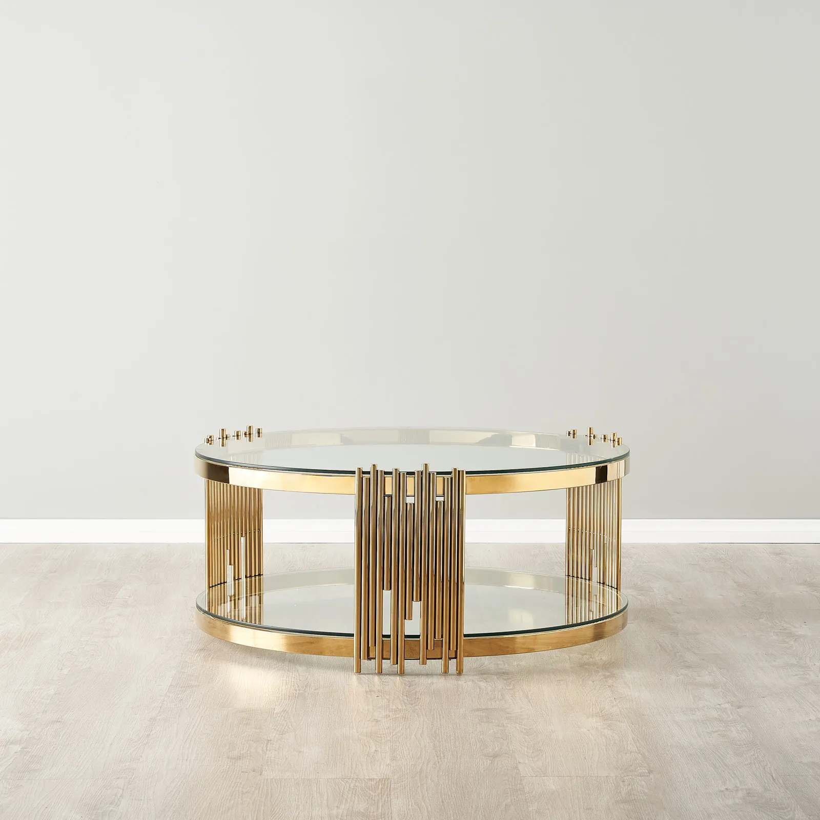 Lindsay Polished Gold Stainless Steel Round Coffee Table - Clear Glass Top