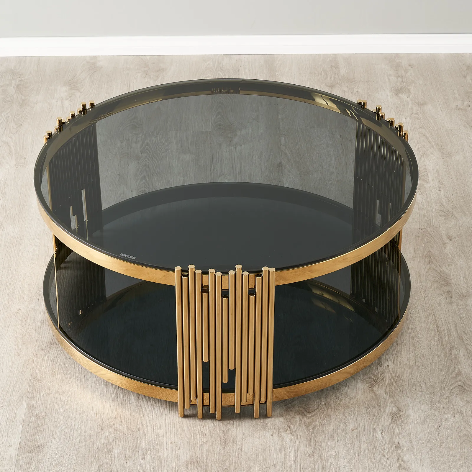 Lindsay Polished Gold Stainless Steel Round Coffee Table - Smoke Glass Top